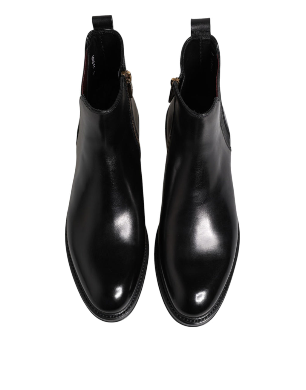 Bottes noires en cuir Chelsea Dolce & Gabbana, mi-mollet, style élégant et moderne, avec semelle en caoutchouc.