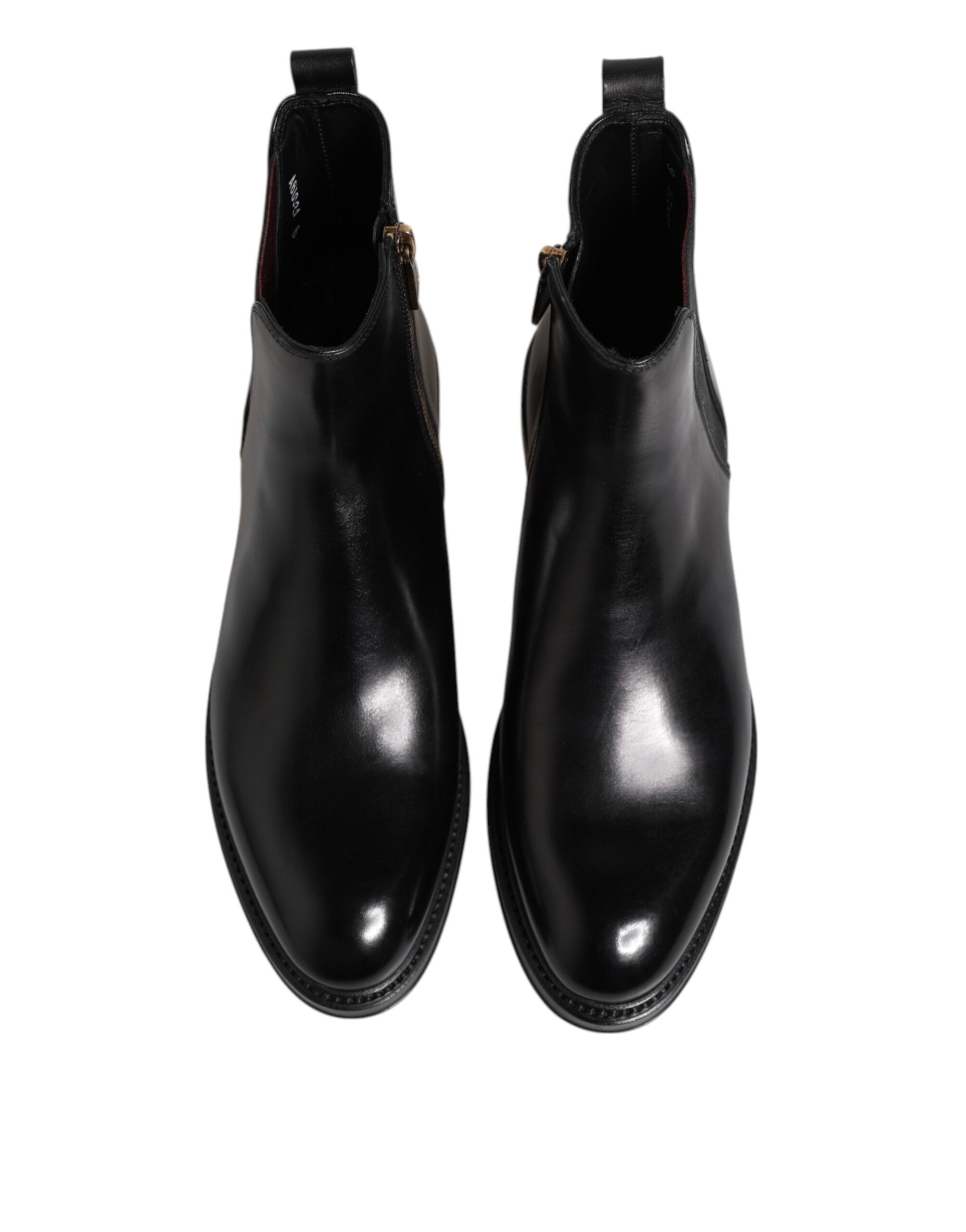 Bottes noires en cuir Chelsea Dolce & Gabbana, mi-mollet, style élégant et moderne, avec semelle en caoutchouc.