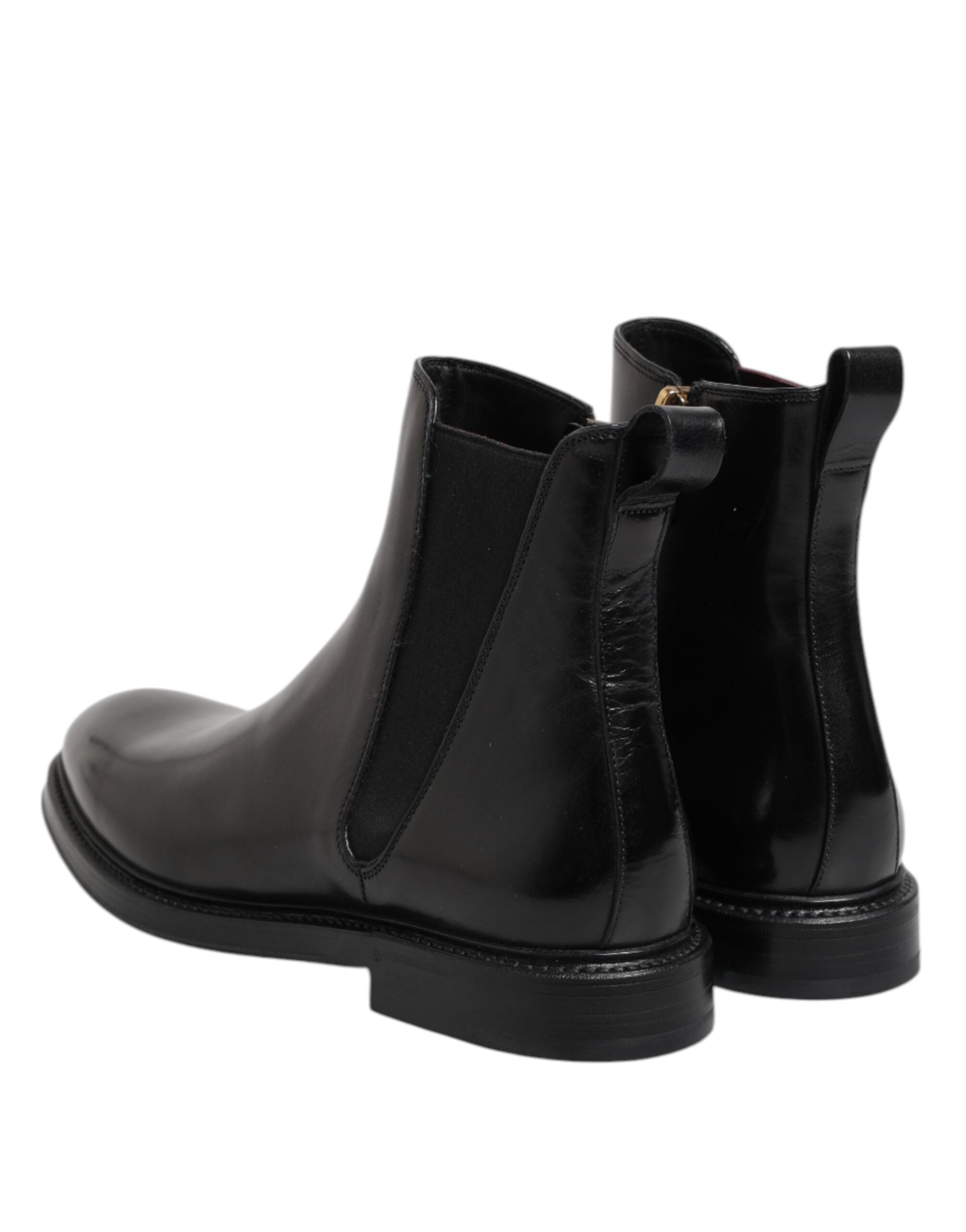 Bottes Chelsea en cuir noir de mi-mollet Dolce & Gabbana, style élégant et sophistiqué, vues de face.
