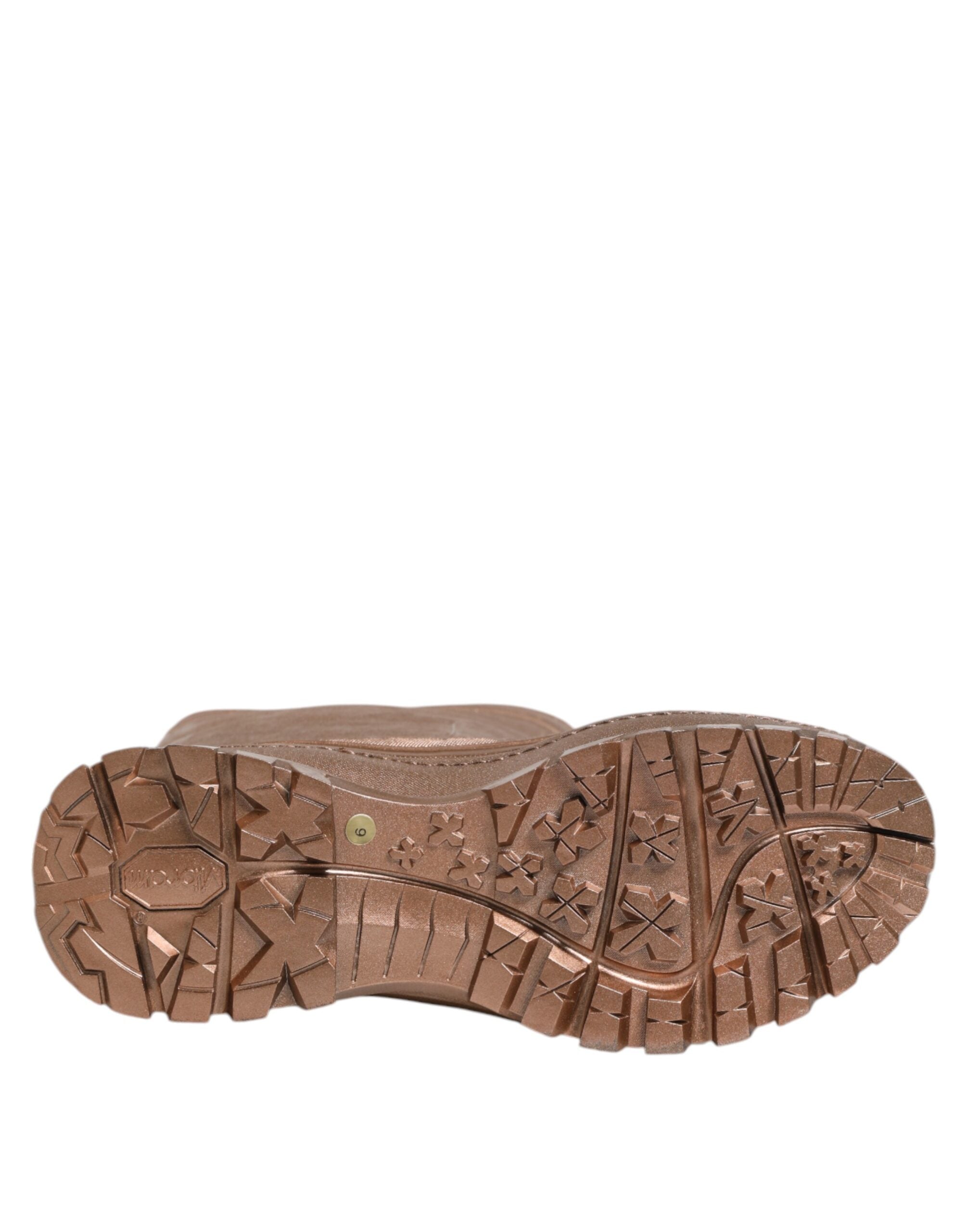 Bottes de pluie en or métallisé Dolce & Gabbana, à enfiler, avec finition brillante et semelle antidérapante.