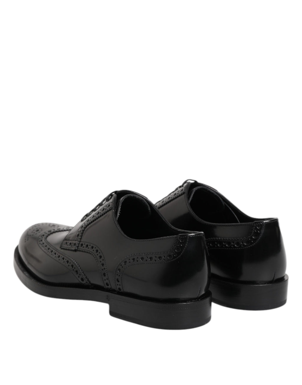 Chaussures derby noires en cuir Dolce & Gabbana, souliers formels wingtip avec détails élégants et finition de haute qualité.
