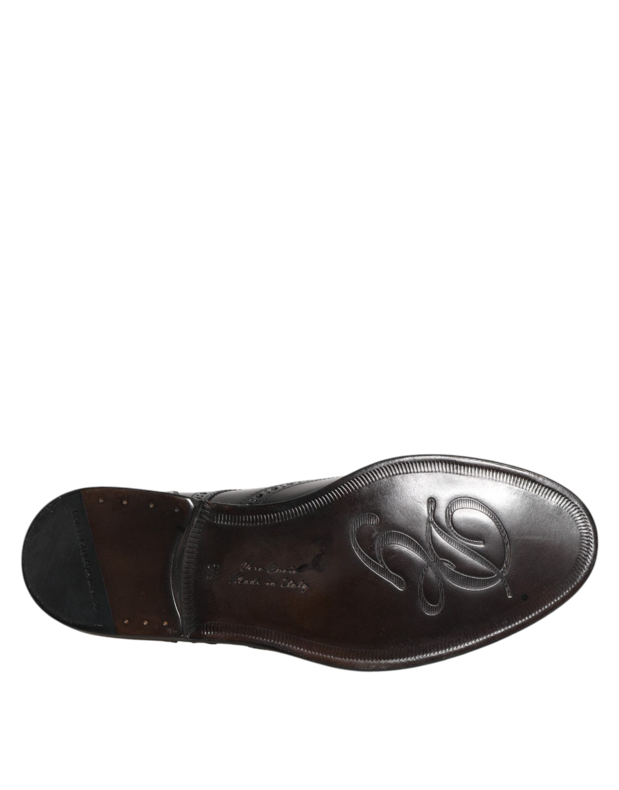 Chaussures Derby wingtip en cuir noir de Dolce & Gabbana, chaussures formelles élégantes pour homme.