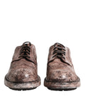 Chaussures brogue en cuir marron distressed de Dolce & Gabbana, lacets, style élégant et sophistiqué.