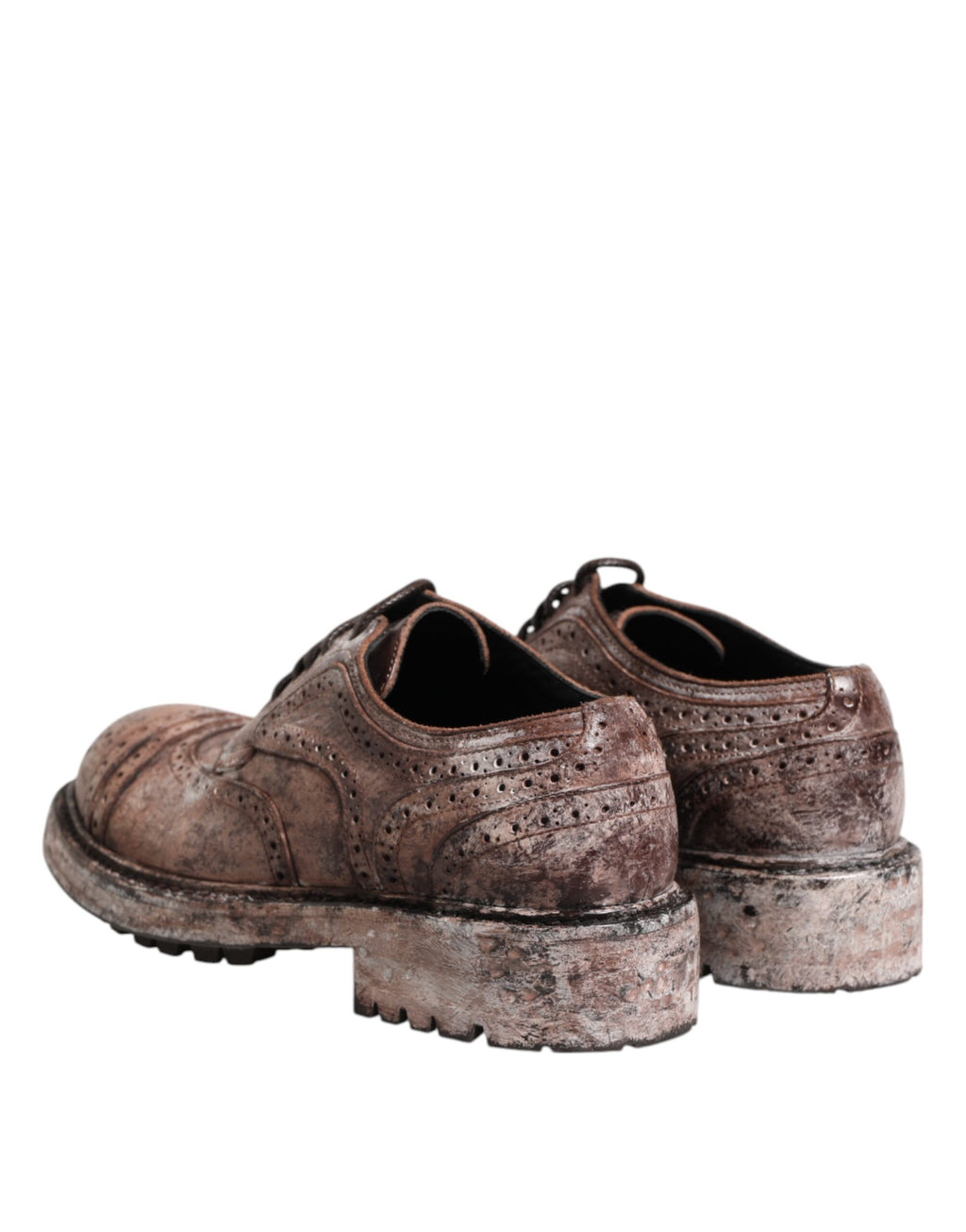 Chaussures brogues en cuir marron distressed de Dolce & Gabbana, lacets, style élégant et sophistiqué.