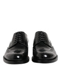 Chaussures Derby Wingtip en cuir noir de Dolce & Gabbana, chaussures formelles élégantes pour homme.