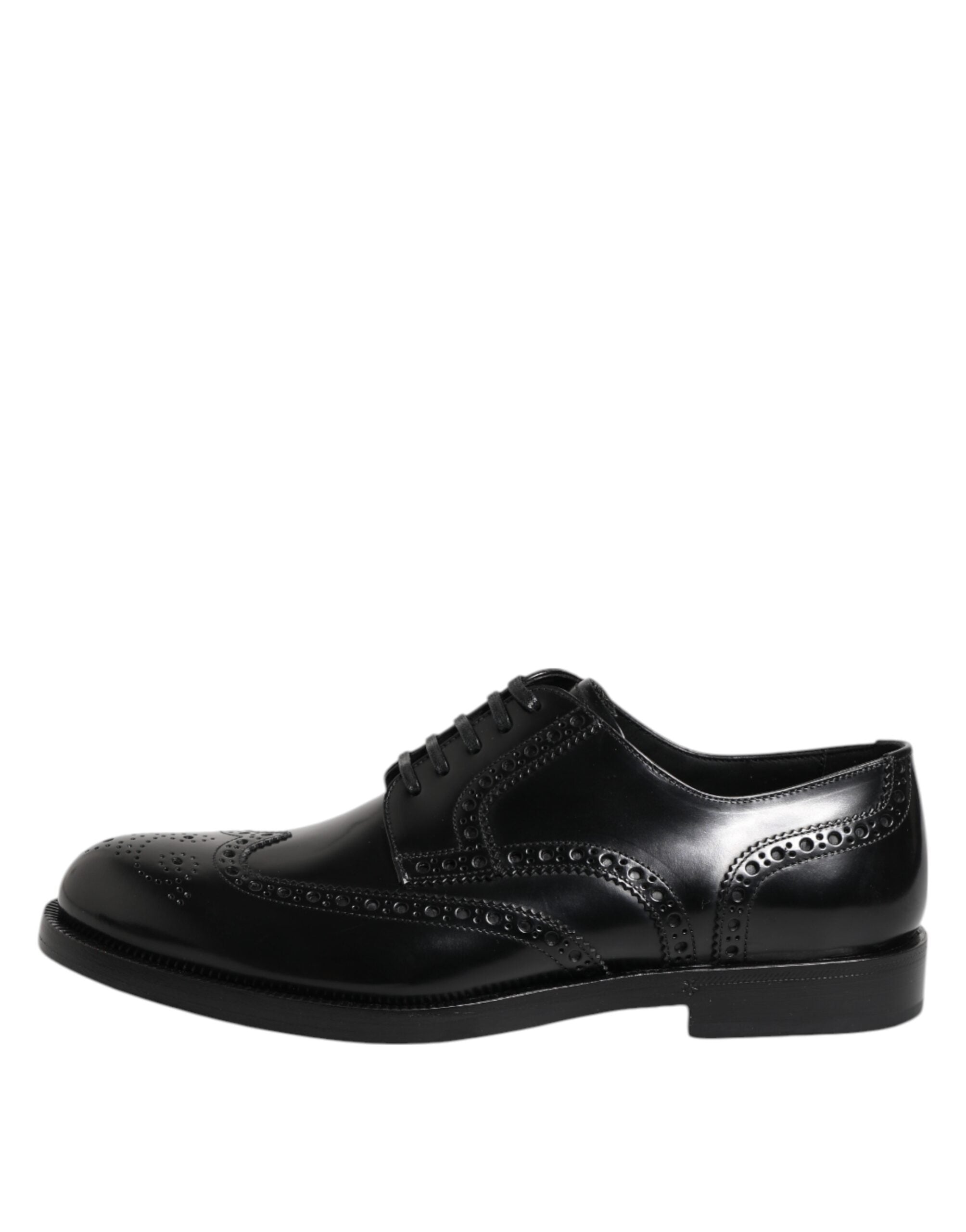 Chaussures Derby en cuir noir Dolce & Gabbana avec ailes wingtip, chaussures formelles élégantes et sophistiquées.