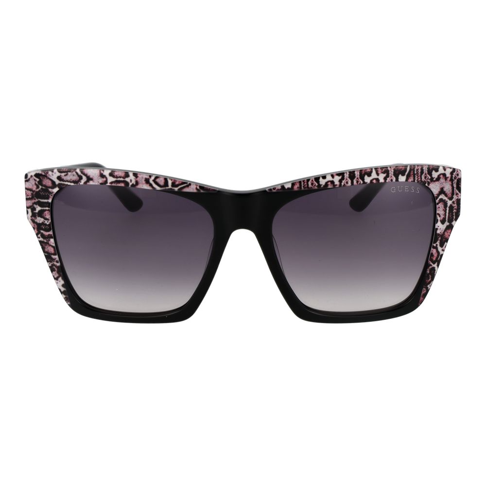 Lunettes de soleil Guess en acétate noir avec monture épaisse et verres foncés, mode élégante et moderne.