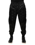 Pantalon jogger homme Dolce & Gabbana noir avec logo DG imprimé, style décontracté et confortable.