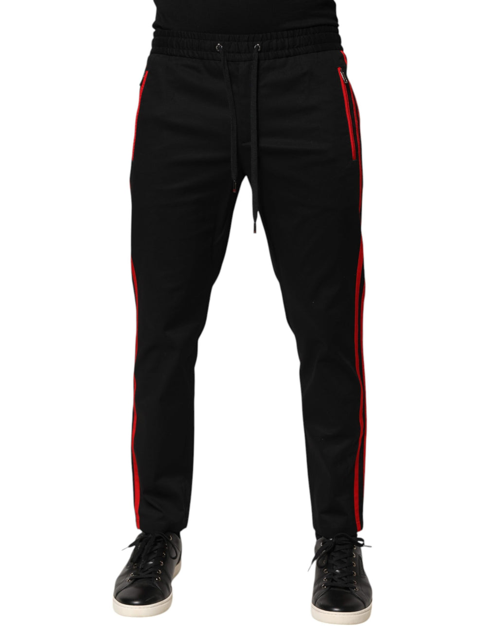 Pantalon de jogging Dolce & Gabbana en coton blanc avec rayures rouges et logo, style décontracté et confortable.