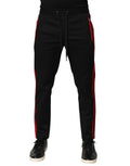Pantalon jogger en coton rouge à rayures et logo Dolce & Gabbana, style décontracté et tendance.
