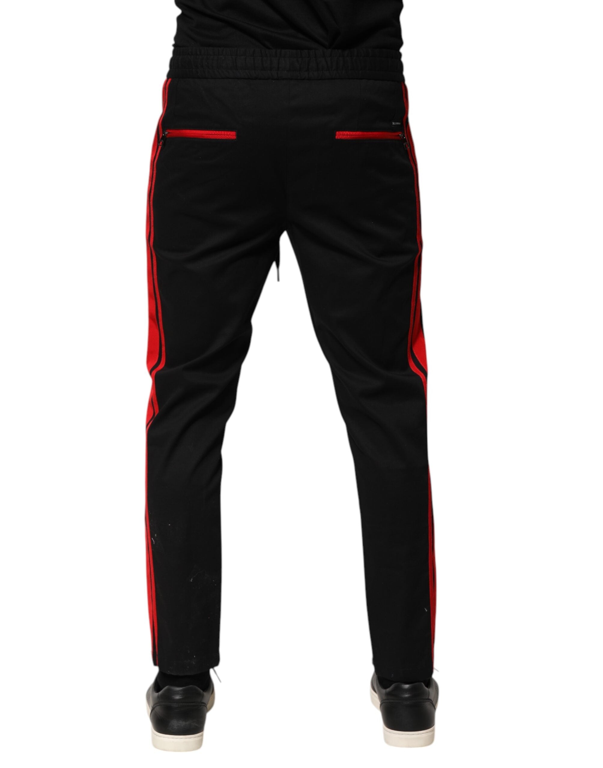 Pantalon de jogging Dolce & Gabbana en coton rouge à rayures, logo, style décontracté, vue de face.