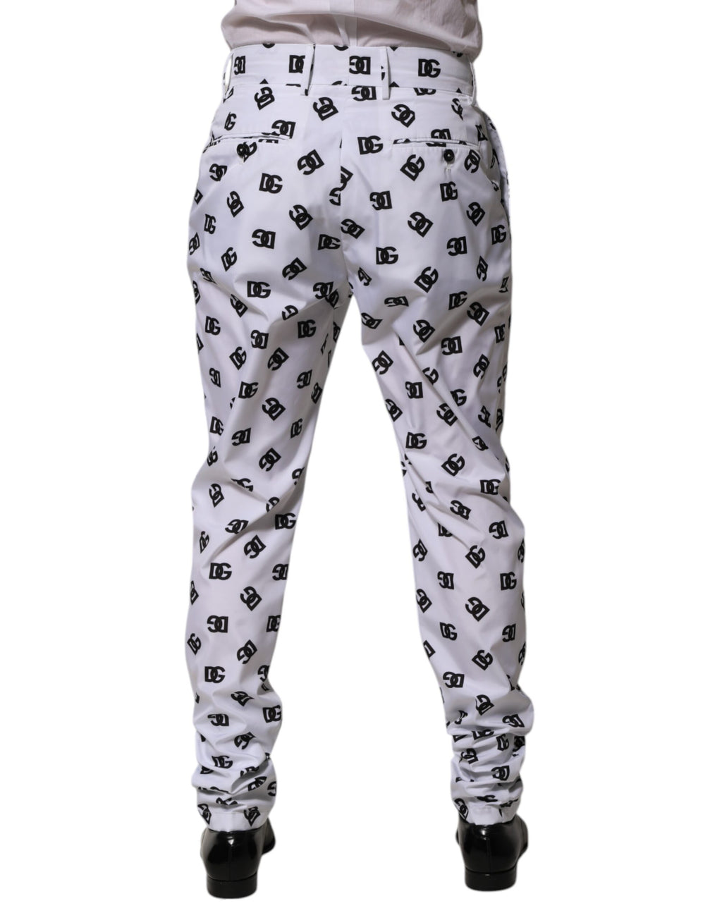 Pantalon skinny en denim blanc Dolce & Gabbana avec logo, coton, vue de face sur un fond neutre.