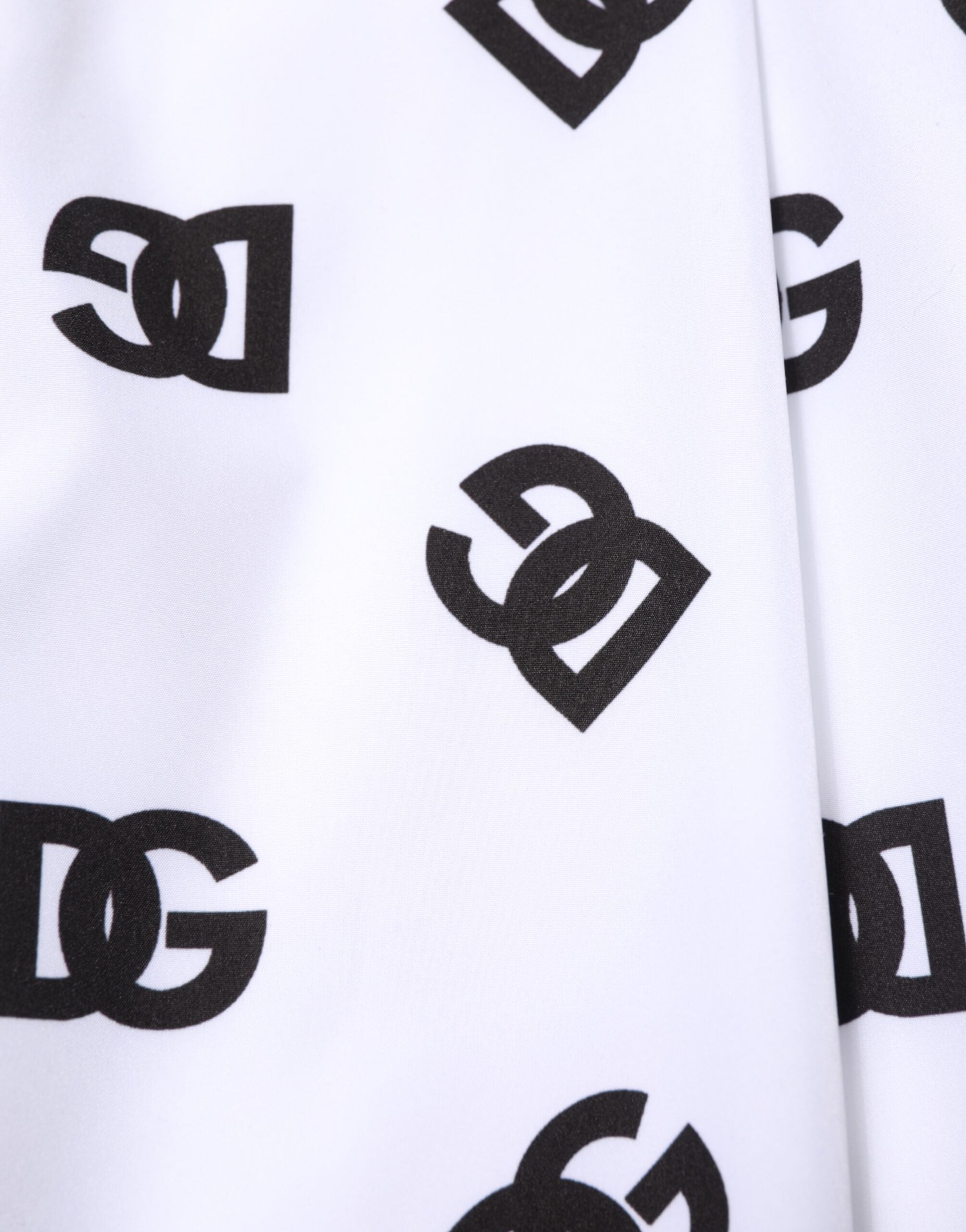 Pantalon skinny en denim blanc Dolce & Gabbana avec logo en coton, vue de face.