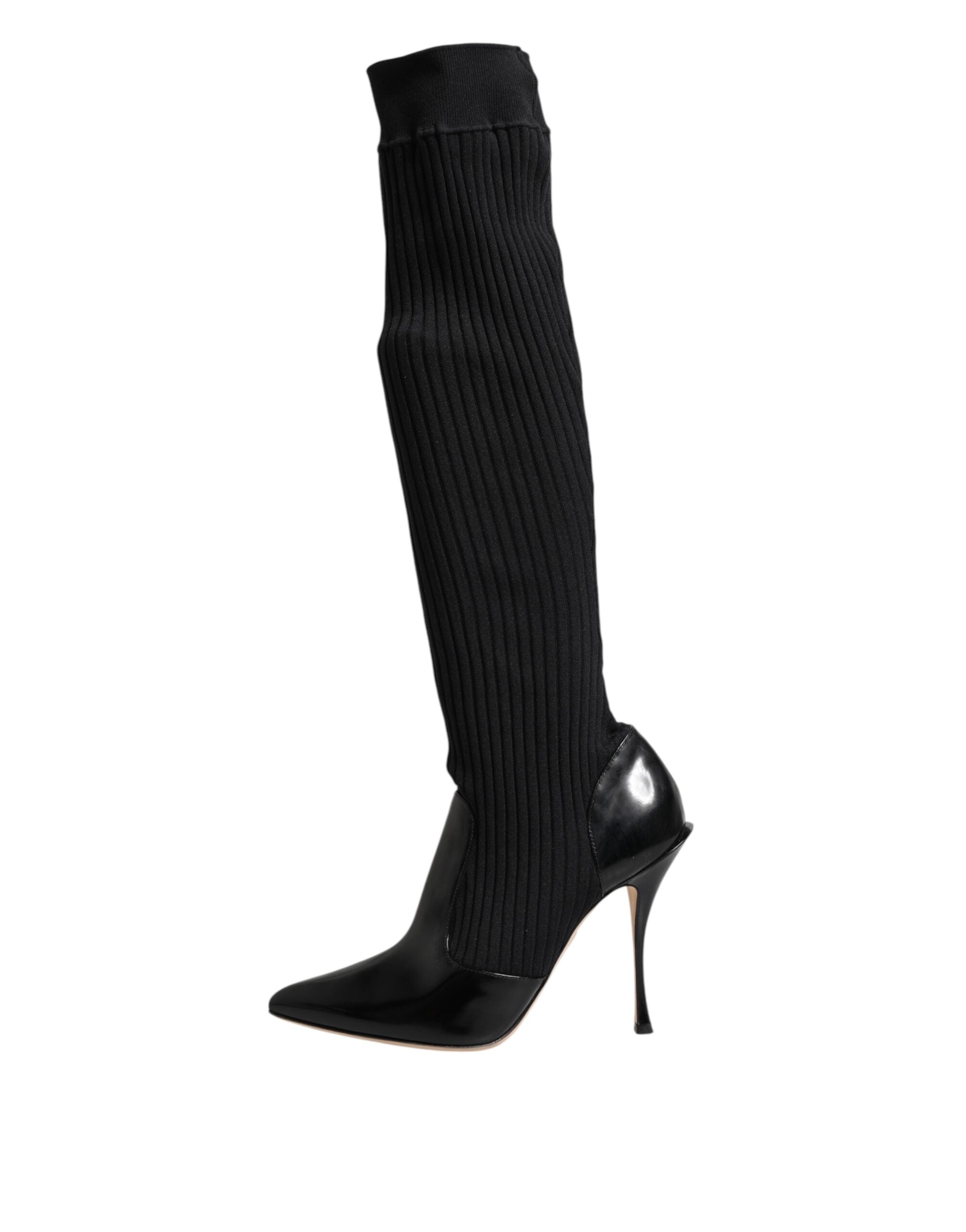 Bottes en cuir noir à côtes, bottes hautes Dolce & Gabbana, chaussures en cuir avec motif côtelé, style élégant et sophistiqué.