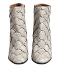 Escarpins en cuir blanc Dolce & Gabbana, bottines à talons, semelle en cuir, détail élégant et sophistiqué.
