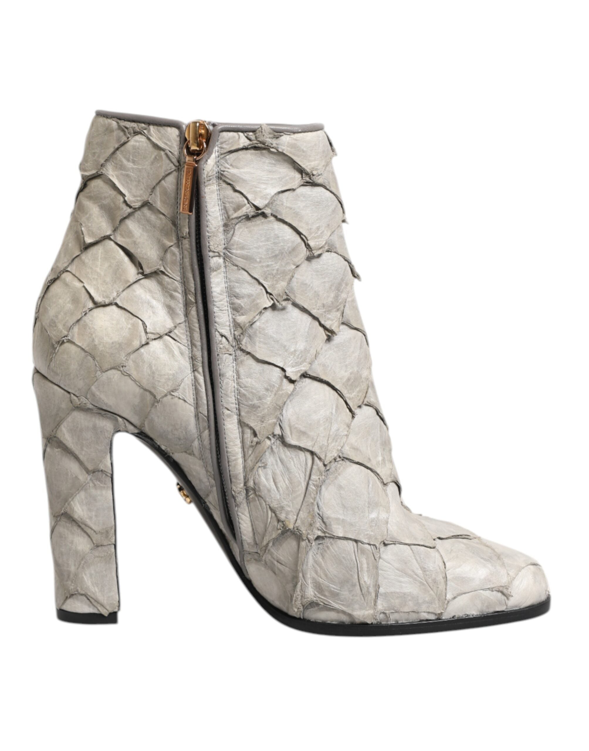 Chaussures à talons Dolce & Gabbana en cuir blanc, bottines élégantes à bout fermé et talon haut, pour femmes.