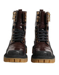 Bottes motard en cuir marron foncé de Dolce & Gabbana, mi-mollet, avec boucle et semelle robuste.