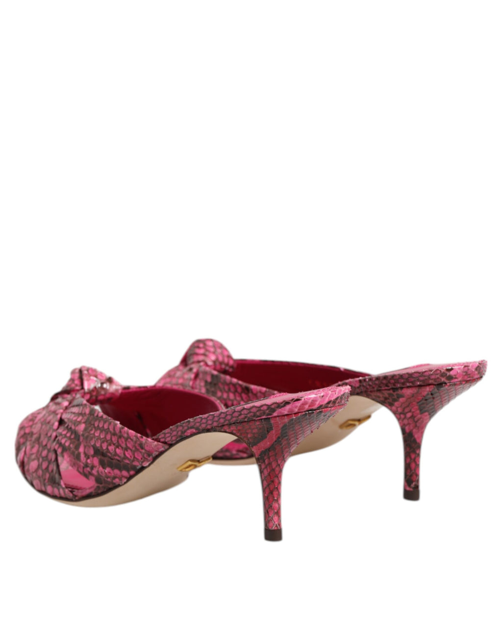 Sandales Dolce & Gabbana en cuir rose avec talons et slides, visibles avec détails de la texture en cuir.