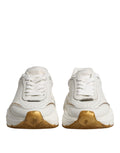 Chaussures basses Dolce & Gabbana Daymaster en or blanc, sneakers élégants pour un style décontracté et sophistiqué.