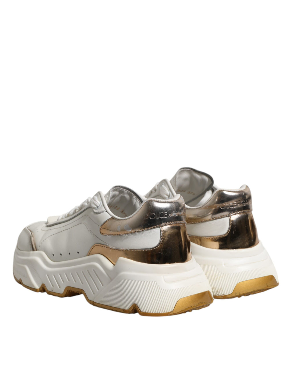 Chaussures basses Dolce & Gabbana Daymaster en or blanc, baskets élégantes en cuir blanc avec détails dorés.