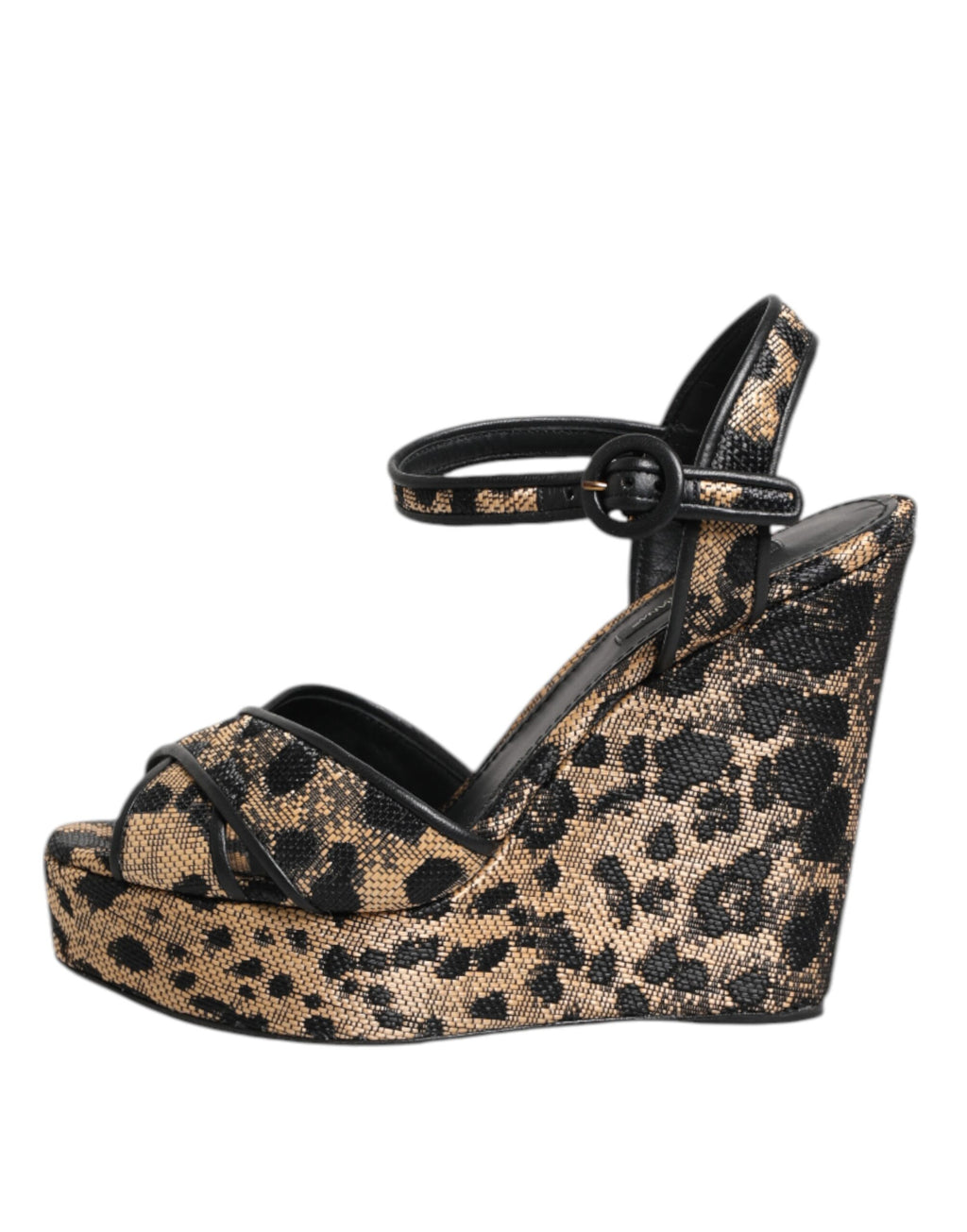 Sandales à talons compensés Dolce & Gabbana en cuir marron avec motif léopard et bride à la cheville.