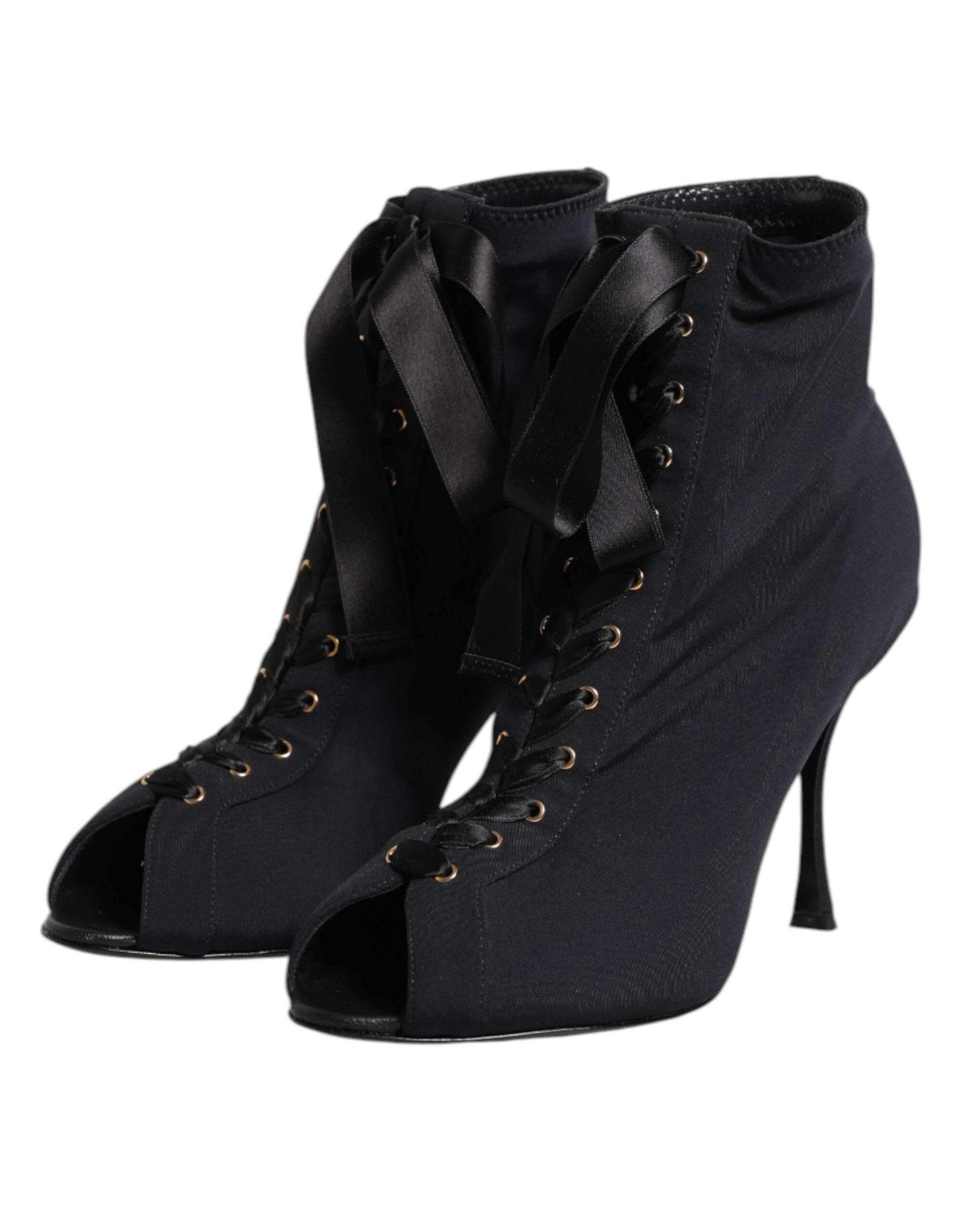 Chaussures Dolce & Gabbana, bottines noires à talons aiguilles et lacets, en cuir élégant et sophistiqué.