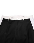Pantalon homme Dolce & Gabbana en laine à rayures noires et blanches, style élégant et moderne.