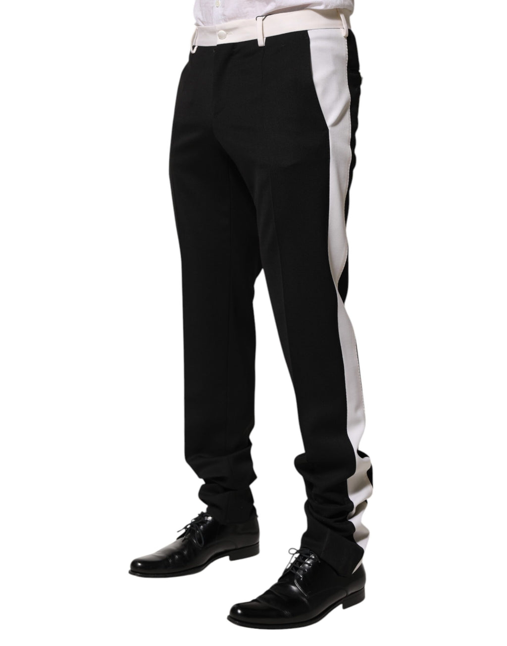 Pantalon homme Dolce & Gabbana en laine noir et blanc à rayures, style élégant et moderne.