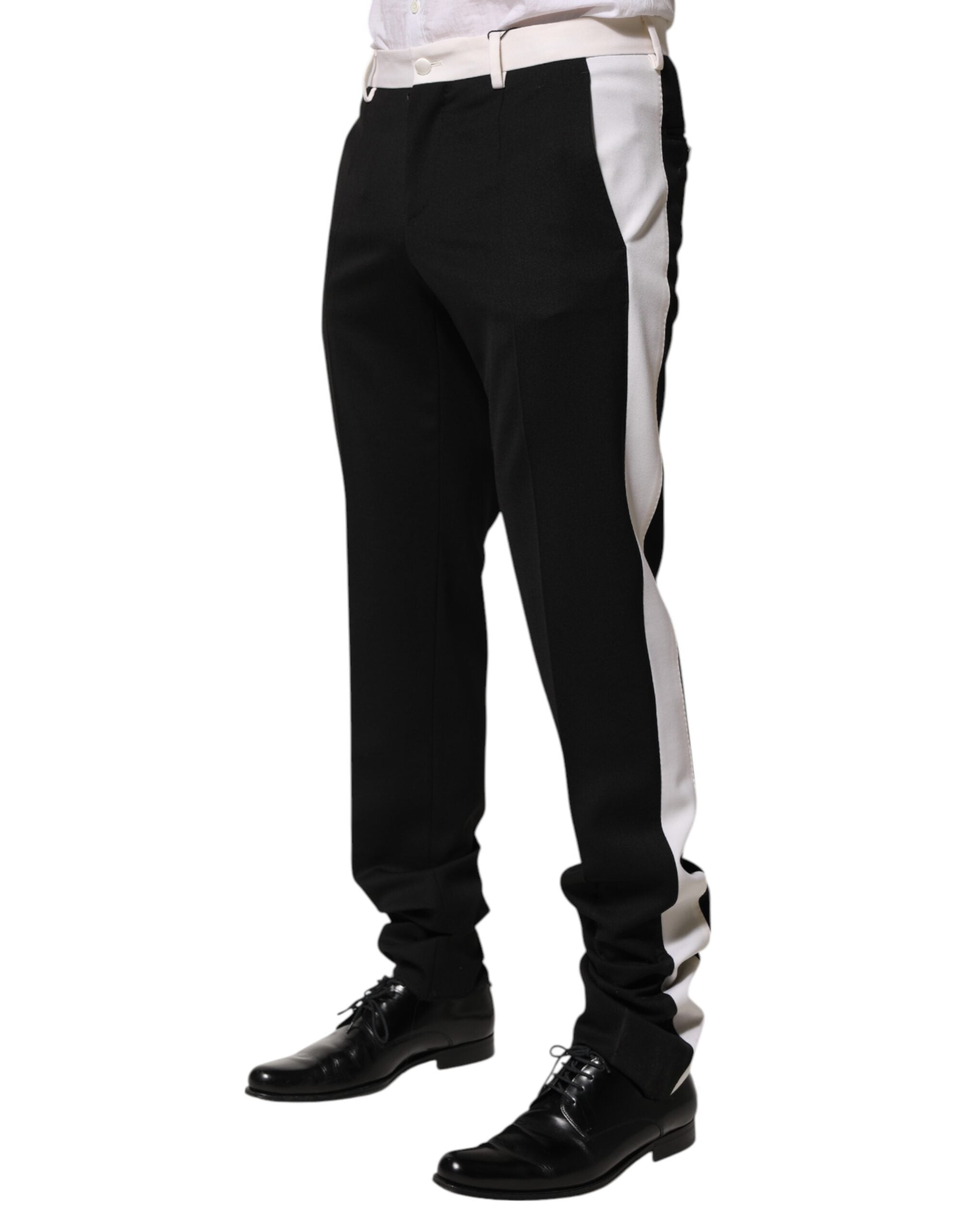 Pantalon homme Dolce & Gabbana en laine noir et blanc à rayures, style élégant et moderne.