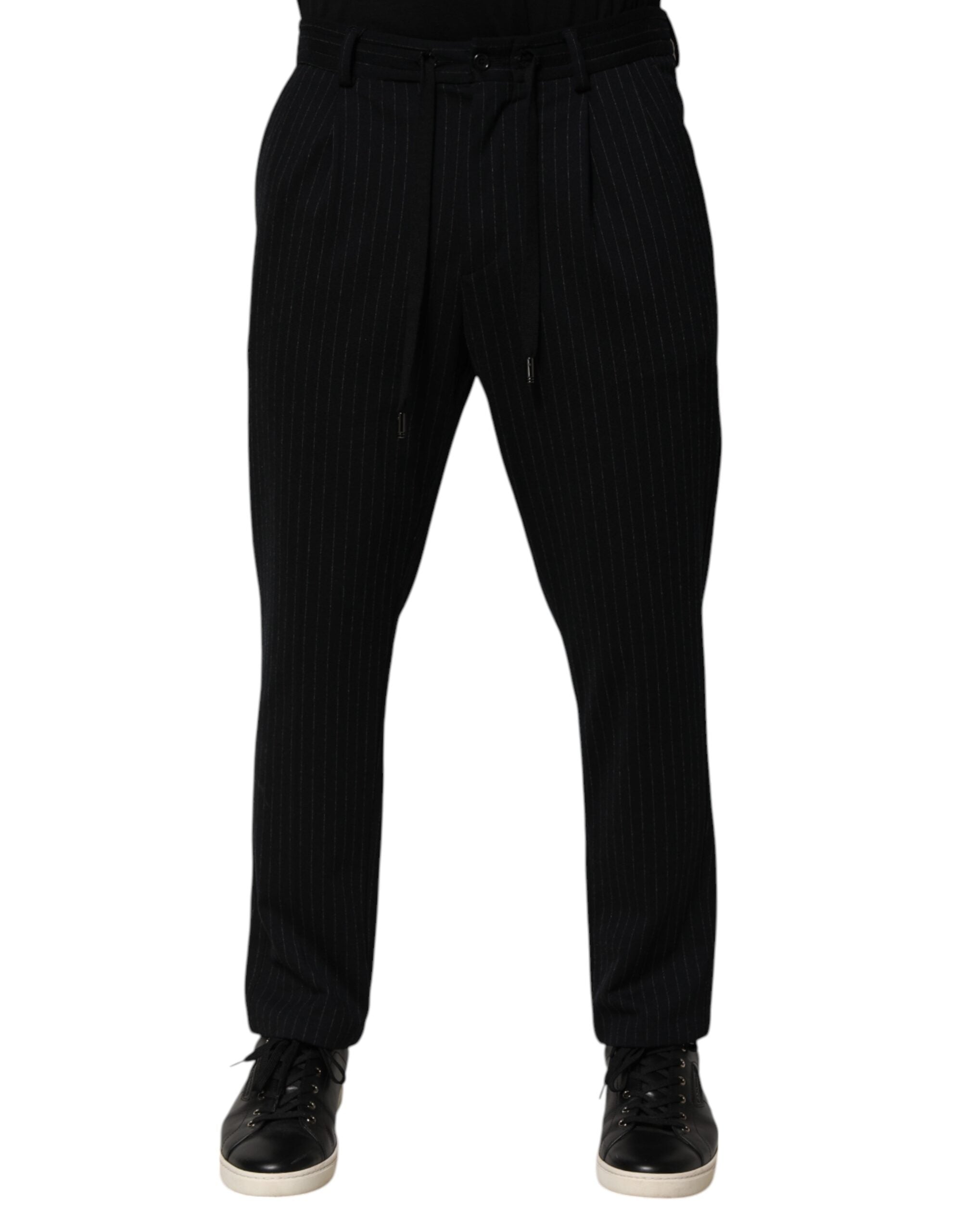 Pantalon skinny noir à rayures en viscose de la marque Dolce & Gabbana, pour hommes, visible en détail dans l'image.