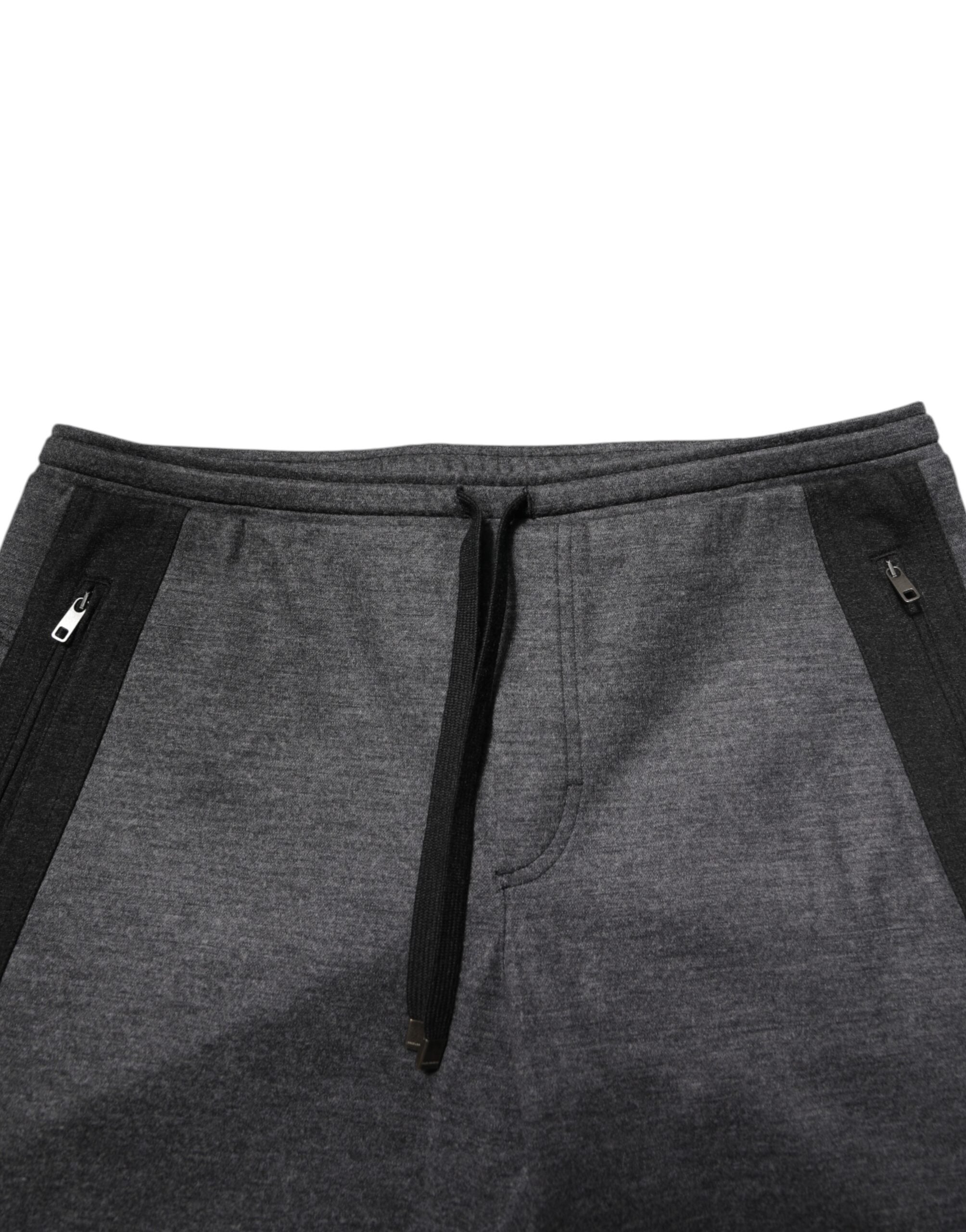 Pantalon de jogging gris et noir en laine mélangée de la marque Dolce & Gabbana, vue de face.