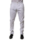 Pantalon slim en coton blanc de robe formelle Dolce & Gabbana porté par un mannequin, vue de face.