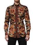 Chemise à manches longues Dolce & Gabbana en coton or avec motif tigre Carretto, motifs colorés et détails élégants visibles.