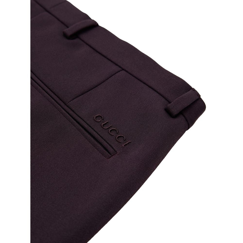 Pantalon en laine bordeaux Gucci pour femme, coupe élégante et tissu de qualité visible sur cette image.