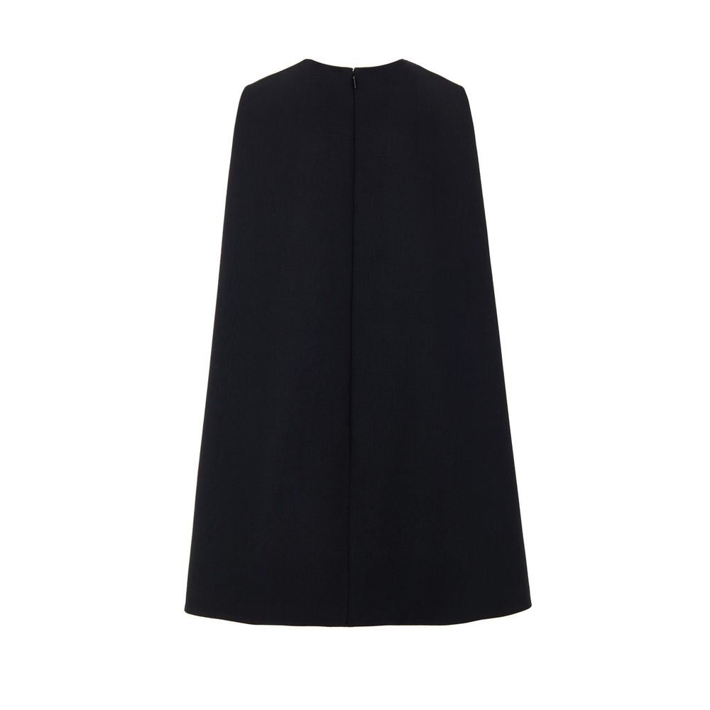 Robe décontractée en laine noire de Gucci, coupe élégante et moderne, portée avec col rond et manches longues.