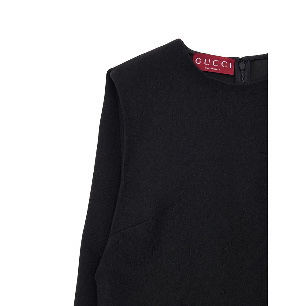 Robe décontractée en laine noire Gucci, coupe simple et élégante, adaptée pour un look casual et chic.