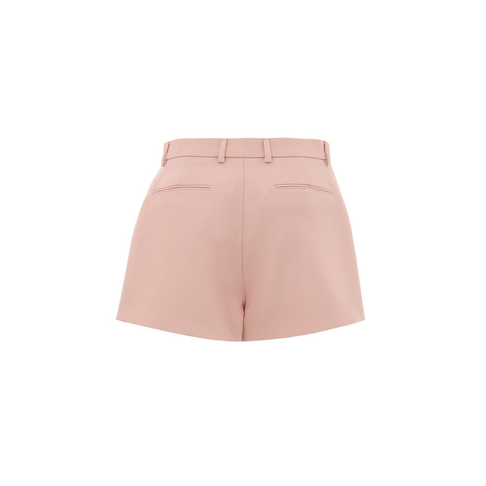Shorts en laine rose Gucci, style décontracté avec coupe moderne, visibles sur l'image, idéal pour un look tendance et élégant.