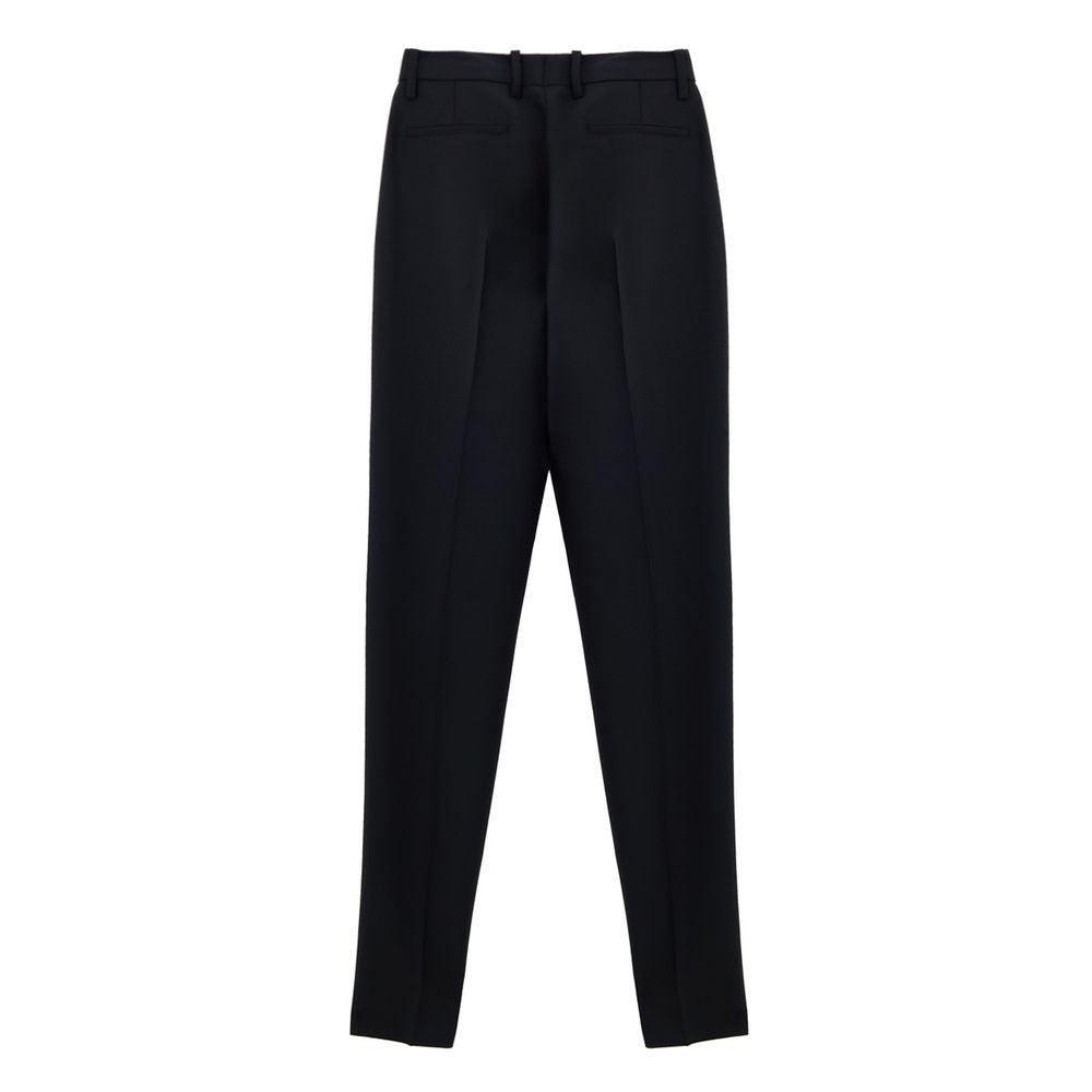 Pantalon habillé en laine noire Gucci pour femme, coupe élégante et tissu de qualité visible sur l'image.