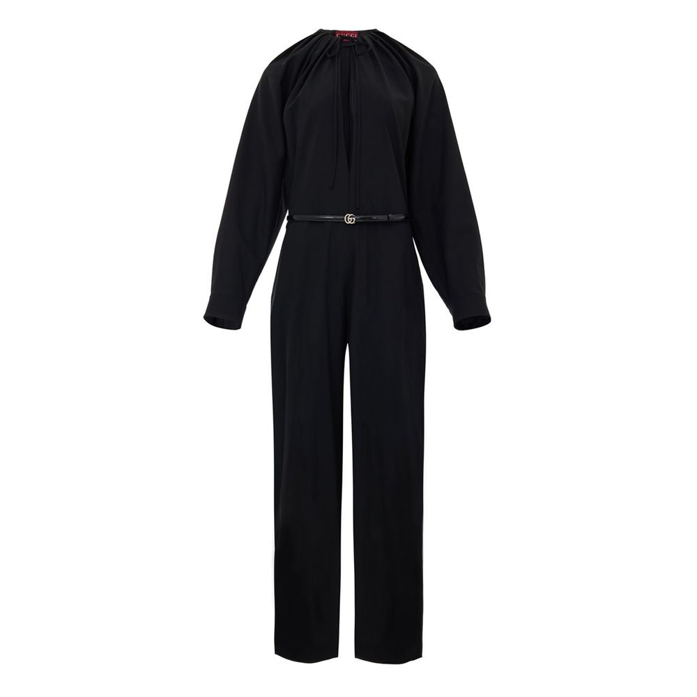 Combinaison en laine noire Gucci élégante, ajustée avec détails sophistiqués, portée par un mannequin.