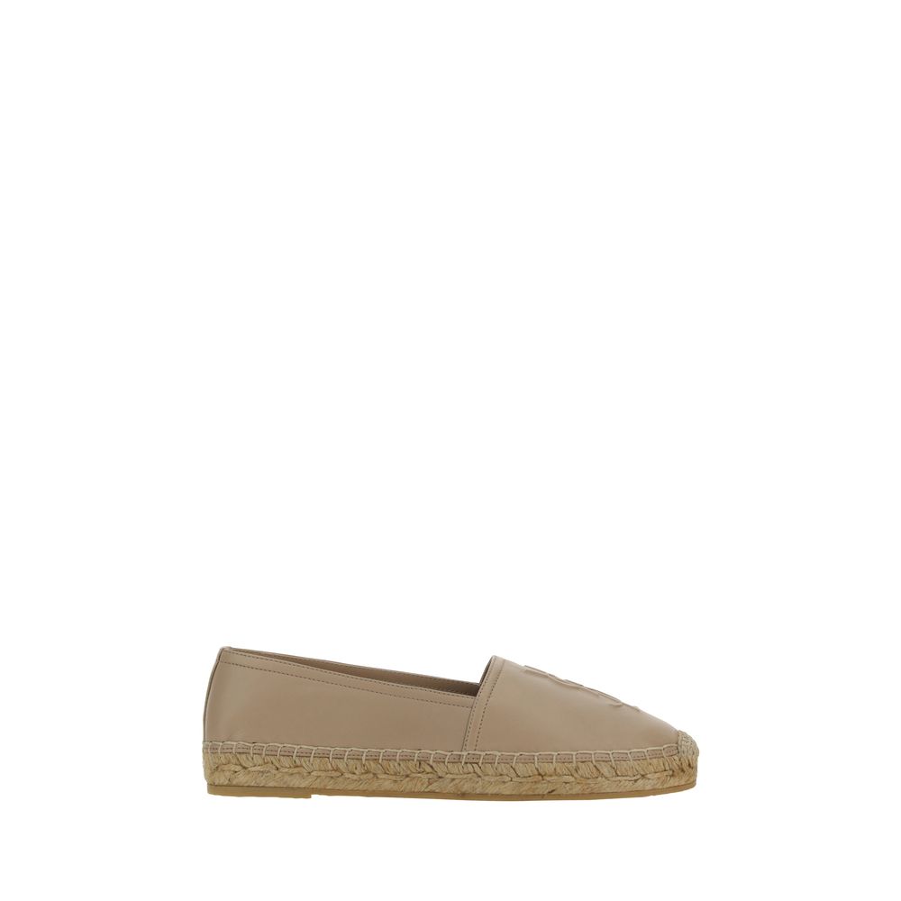 Espadrilles beige en agneau Ovis Aries de Saint Laurent avec semelle en corde, style élégant et confortable.