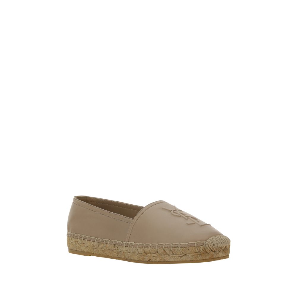 Espadrilles beige en agneau de Saint Laurent, style élégant et confortable, avec semelle en corde naturelle.