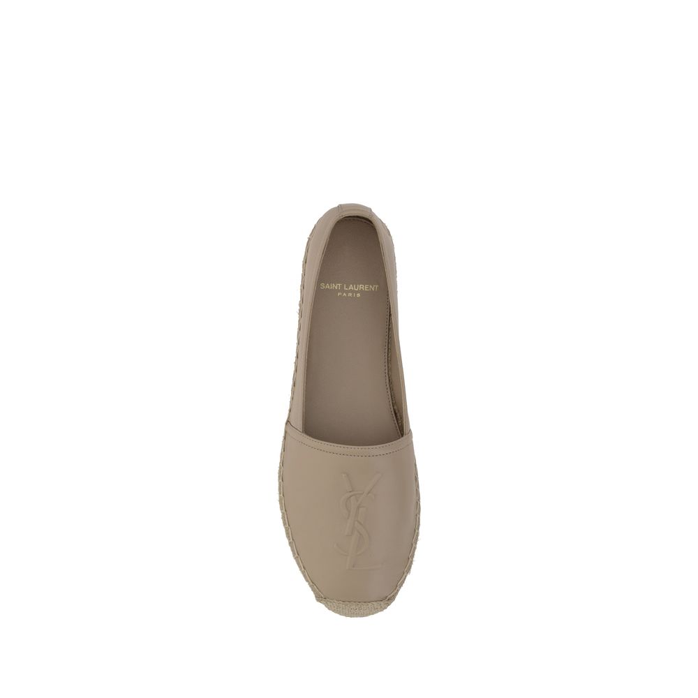 Espadrilles beige en agneau Ovis Aries de Saint Laurent, avec semelle en corde et design élégants.