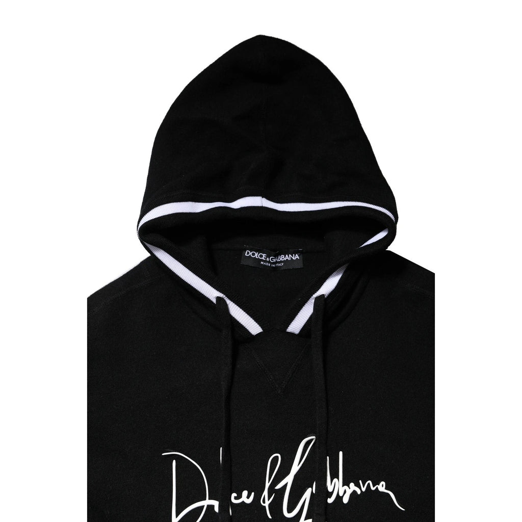 Sweatshirt à capuche noir Dolce & Gabbana avec logo imprimé, look décontracté et style élégant, vue de face.