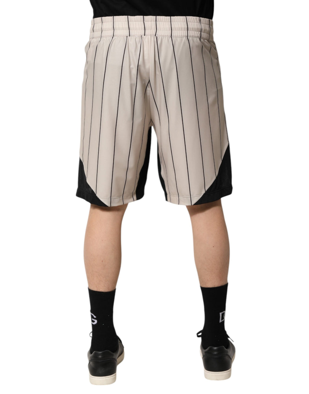 Shorts sweat Dolce & Gabbana en polyester blanc cassé avec logo DG, style décontracté et moderne.