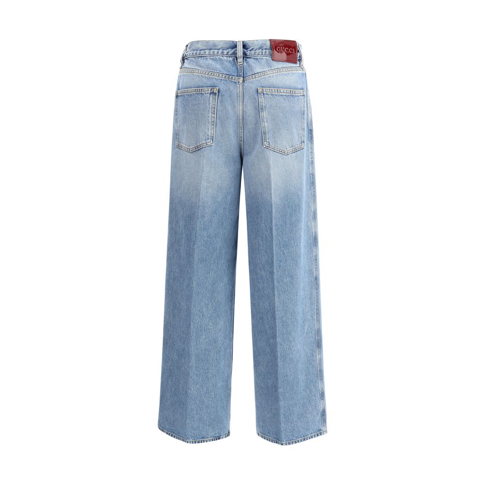Jeans en coton bleu clair de Gucci, denim, avec coupe classique et détails élégants visibles sur l'image.