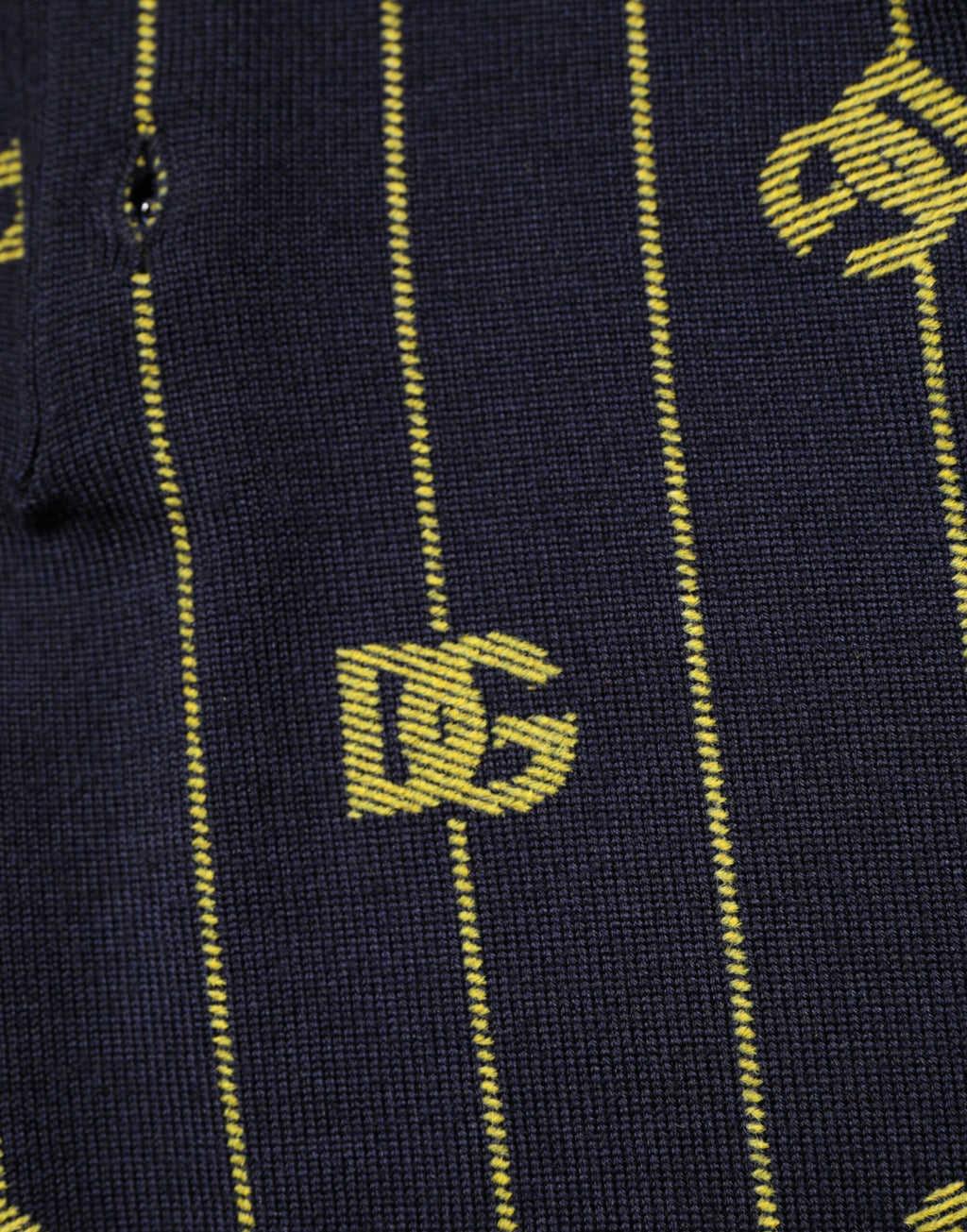 Polo en jersey jacquard noir avec logo Dolce & Gabbana, manches courtes et col polo, pour homme.