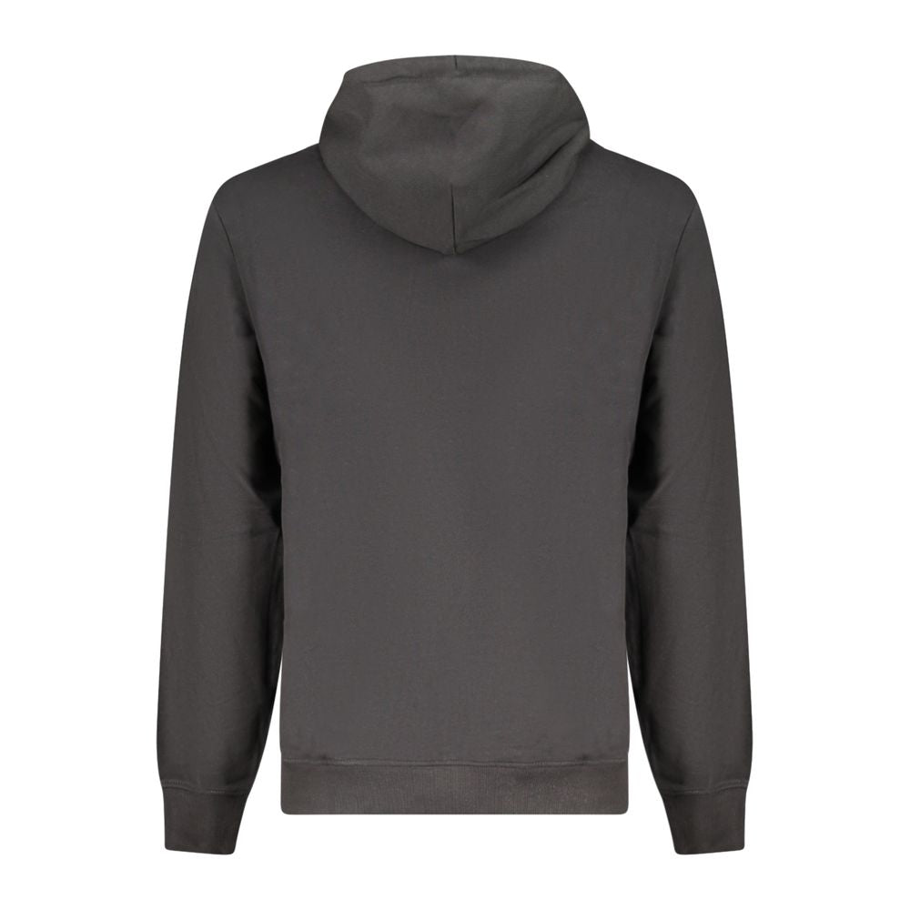 Sweat à capuche pour homme Tommy Hilfiger en coton noir avec logo sur la poitrine, vue de face.