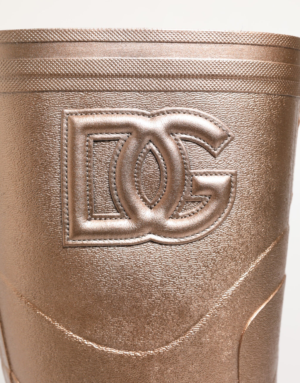 Bottes de pluie en caoutchouc rose doré Dolce & Gabbana à enfiler, style élégant et résistant à la pluie.