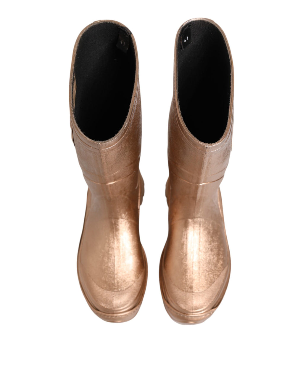 Bottes de pluie en caoutchouc rose doré Dolce & Gabbana à enfiler, style élégant et moderne, visibles sur l'image.