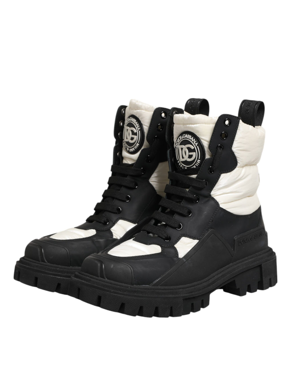 Bottes hautes noires et blanches Dolce & Gabbana en cuir rembourré, avec lacets et semelle antidérapante.